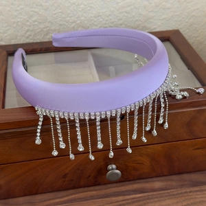 Detail of light purple satin headband with sparkling rhinestone fringe tassels and water drop beads