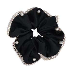 Elegant black satin scrunchie with beige lace trim and white pearls for women's hairstyle