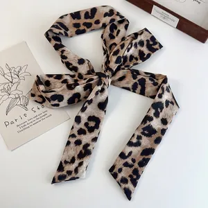 Elegant leopard print silk scarf ribbon for neck, hair and waist in autumn brown tones