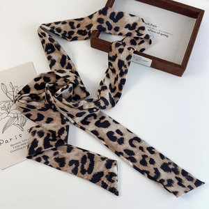 Elegant leopard print silk neck tie scarf with retro brown tones for versatile styling