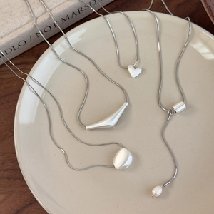 Minimalist silver brushed snake chain necklace set with heart and geometric pendants