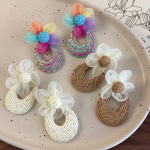 Handmade woven floral earrings in rainbow, beige and brown for beach vacations