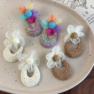 Handmade woven flower earrings set in bohemian style for summer beach vacations