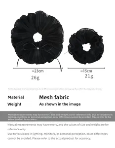 Size comparison of large and small black mesh bow scrunchies with exact dimensions