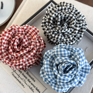 Three-piece checkered fabric camellia hair claws in red, blue, and black colors