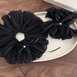 French vintage oversized black mesh bow hair scrunchies with rhinestones in a ceramic tray