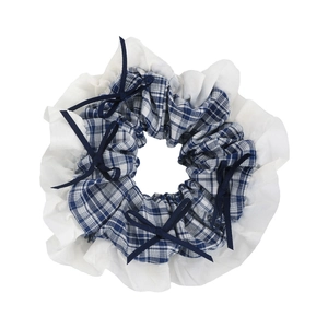 Blue plaid scrunchie with lace trim and dark blue ribbons for ponytail hairstyles