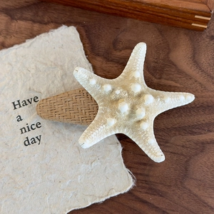 Natural starfish hair clip with brown woven texture for beach holiday seaside style