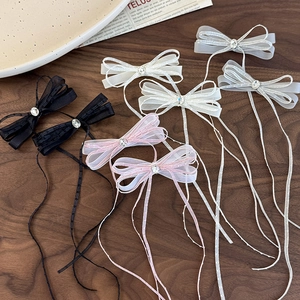 Elegant ballet-style bow hair clips with mesh ribbon, rhinestones, and long tassels