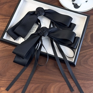 French vintage black satin bow hair clips with elegant camellia floral accents