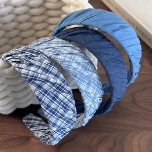 French vintage blue plaid and striped fabric headbands in a stylish twisted pleated design