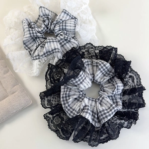 Lace-trimmed plaid scrunchies set in black and grey cotton for a romantic French style