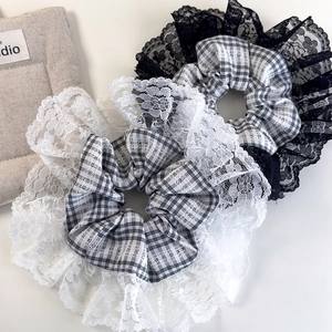 Vintage plaid scrunchies set with delicate lace trim for elegant hairstyles
