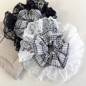 Lace-trimmed plaid scrunchies in black and grey for elegant French style hairstyles