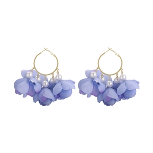 Elegant gold flower tassel earrings with blue fabric petals and pearls for vacation style