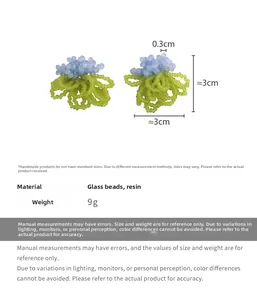 Detailed view of light blue and green beaded earrings with size 3cm and 9g weight specs