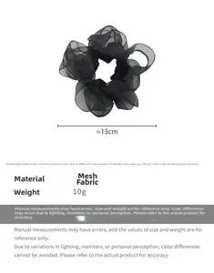 Detail view of black organza scrunchie with 13cm diameter measurement and specifications