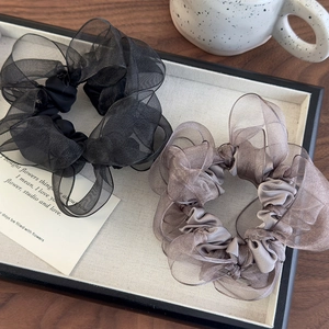Set of large organza hair scrunchies in black and brown with a pleated ruffled design