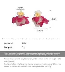 Detailed size view of lightweight pink chiffon flower earrings weighing 3g and 6cm long