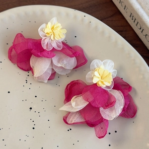 Pink tulle flower earrings with multi-layer mesh petals and yellow floral center
