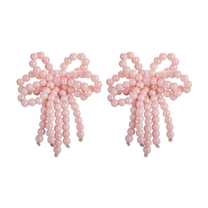 Breloques de chaussures nœuds en perles roses avec franges pour un style doux