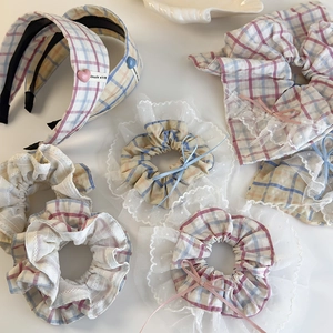 Sweet plaid scrunchie and headband set with lace trim and heart charms on white background