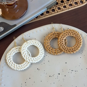 Bohemian large round woven rattan earrings in white and natural brown with gold hooks