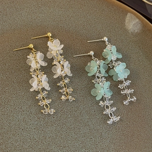 Bohemian floral tassel earrings with matte petals and crystal beads in white and green