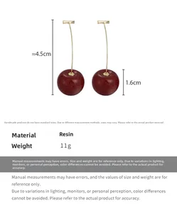 Detail shot of cherry earrings with dimensions showing 4.5cm length and 1.6cm resin ball