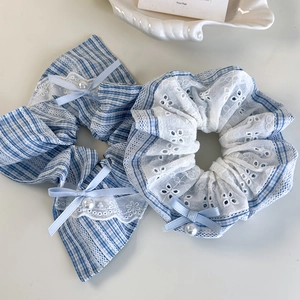 Blue and white plaid scrunchie with lace trim and bow knot hair accessory for women