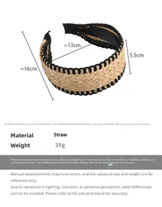 Detail view showing dimensions of a straw woven headband with black trim and 5.5cm width
