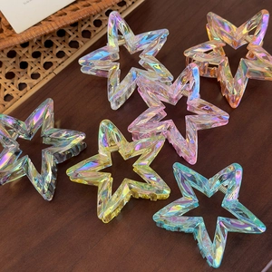 Set of six colorful hollow star acrylic hair claws with iridescent laser finish effect