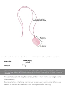 Pink comb pendant necklace on wax rope with dimensions 4.8x3.5cm and 82cm circumference