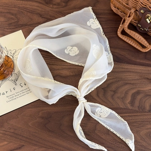 French style cream white lace triangle scarf with rose embroidery on wooden surface