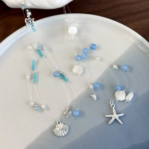 Three-layer ocean style necklace with blue glass beads and silver starfish charms