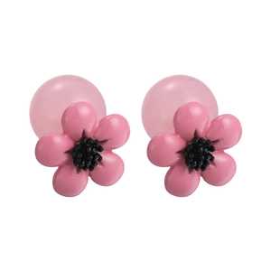 Pink resin flower stud earrings with glossy petals and translucent bead backings