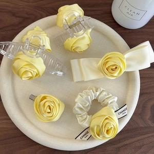 4-piece yellow handmade 3D rose hair accessory set featuring satin flowers and acrylic clips