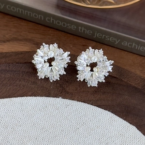 Elegant silver fireworks flower stud earrings with white pearls and cubic zirconia