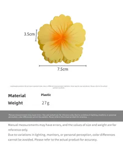 Detail of yellow flower hair claw clip with frosted texture and gradient petal design