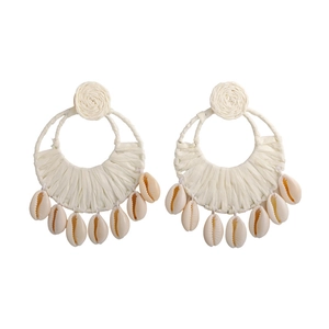 Bohemian large hoop earrings with raffia weave and hanging natural cowrie shells