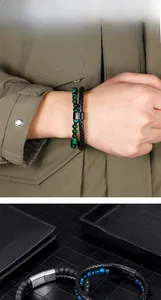 Close-up of green malachite beads and black braided leather bracelets for men
