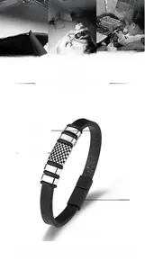 Detail view of black PU leather bracelet for men featuring textured silver alloy magnetic clasp