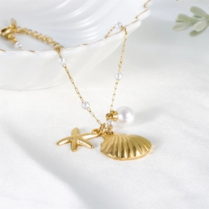Bracelet en Acier Inoxydable Plaqué Or Avec Pendentifs Coquille Étoile de Mer et Künstliche Perles Blanches Bijoux Style Océan pour Femmes Vacances