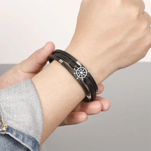 Herren-Lederarmband geflochten mit silbernem Ruder-Anhänger und Magnetverschluss