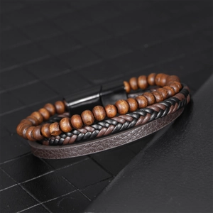 Men's multilayered leather and wood bead bracelet with a black magnetic clasp