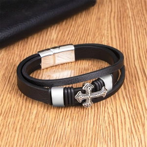 Multi-layer black leather cross bracelet for men with silver magnetic clasp on wood