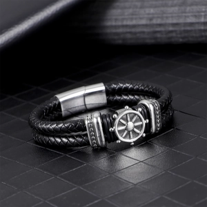 Men's braided leather pirate bracelet with stainless steel magnetic clasp and helm charm