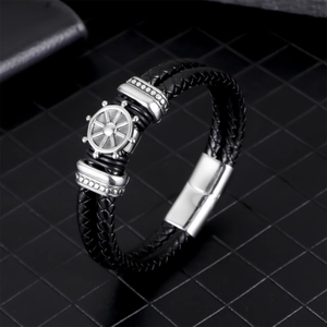 Men's black braided leather pirate bracelet with silver ship wheel and magnetic clasp