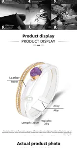 Detailed view of multilayer leather wrap bracelet with crystal cluster and pearl accent