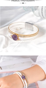 Detail of multi-layer white leather wrap bracelet with purple druzy and magnetic buckle